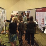 Speaking with delegates at the poster session